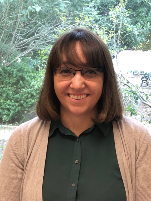 A woman scientist with dark hair