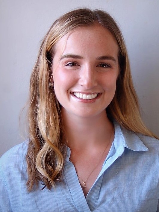 Smiling woman with long blonde hair