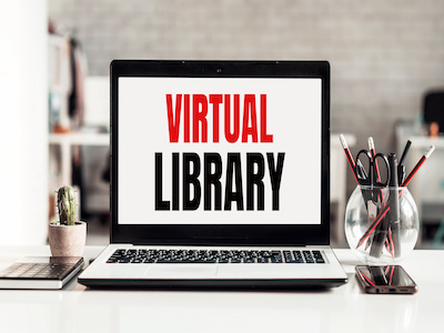 a laptop with the word virtual library displayed on the scree